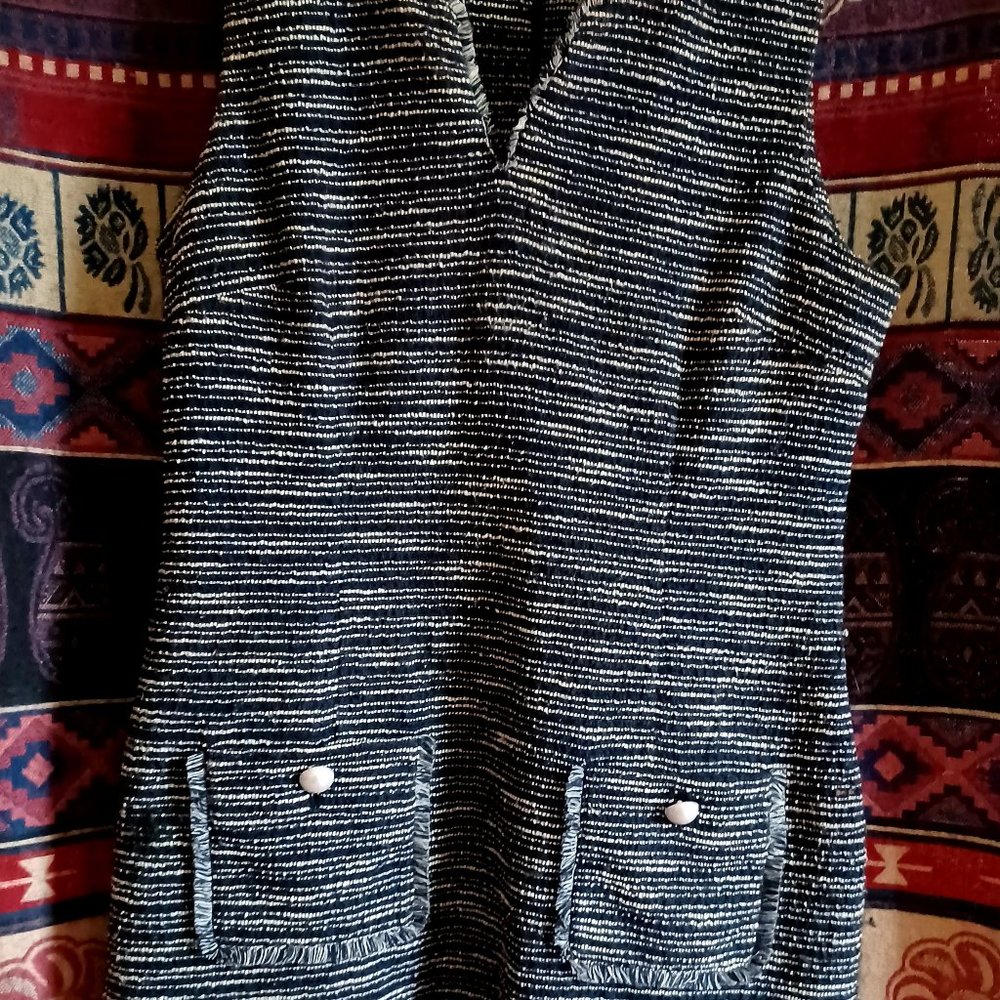 Sleeveless, mid-season dress
